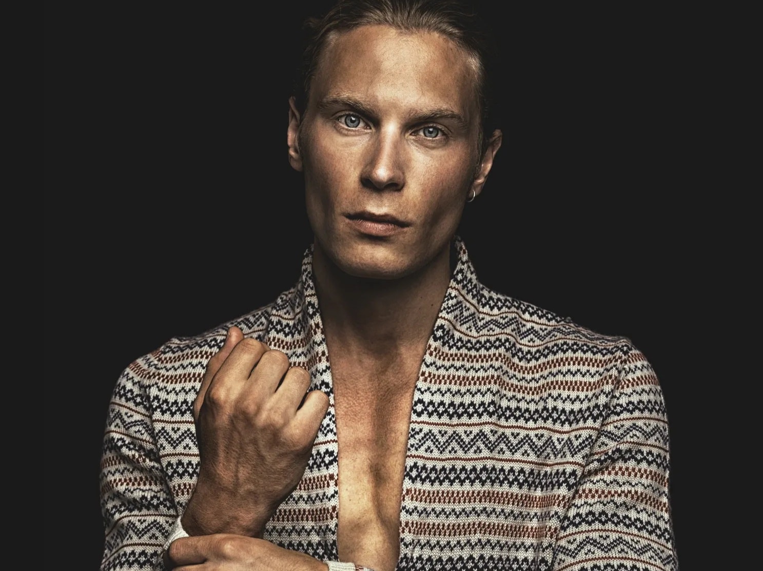 Editorial portrait of male talent in a studio